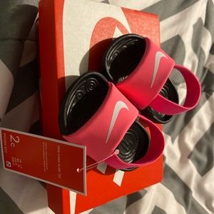 Size 2 c Nike slides BRAND NEW with tags